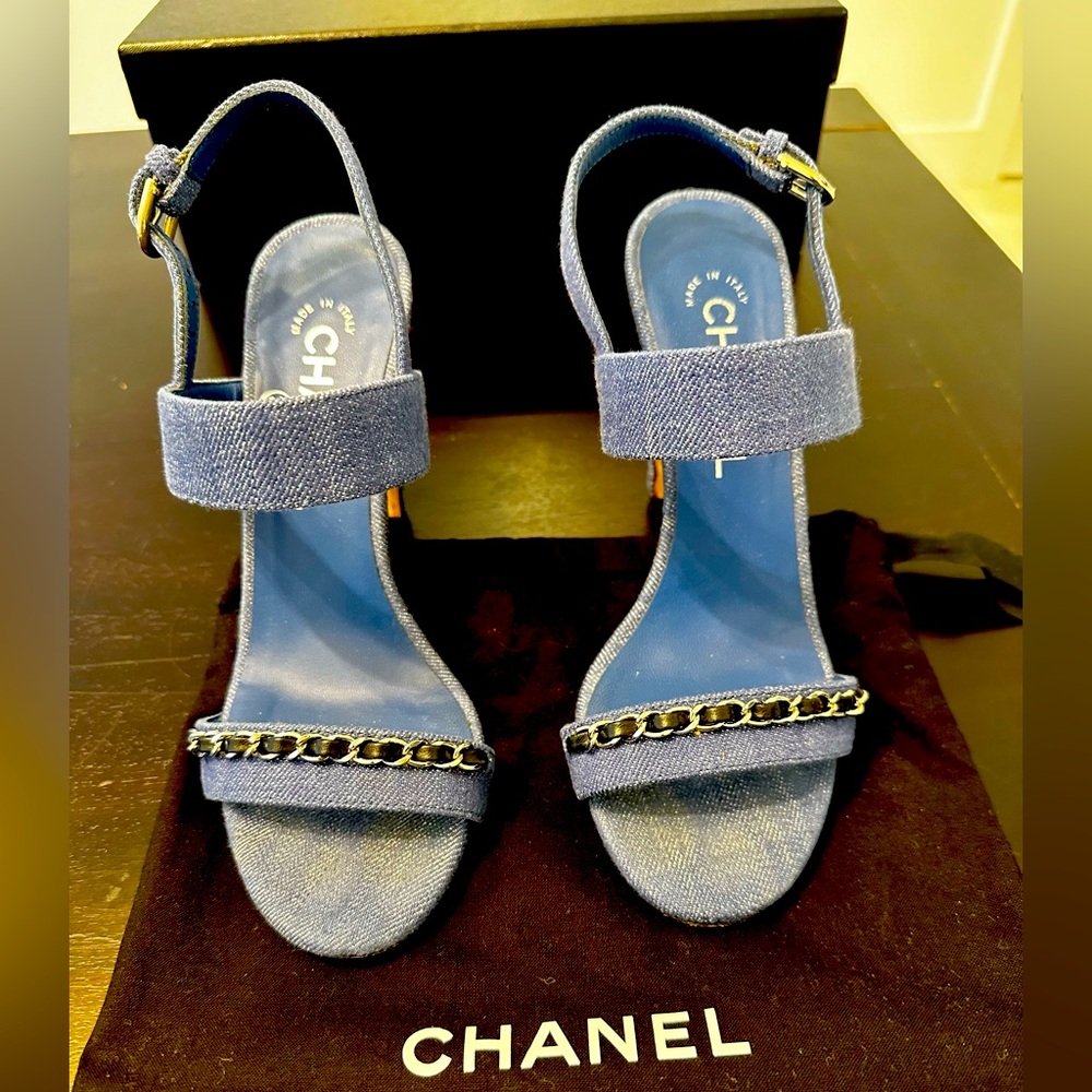 CHANEL blue denim sandal heels with silver hardware.